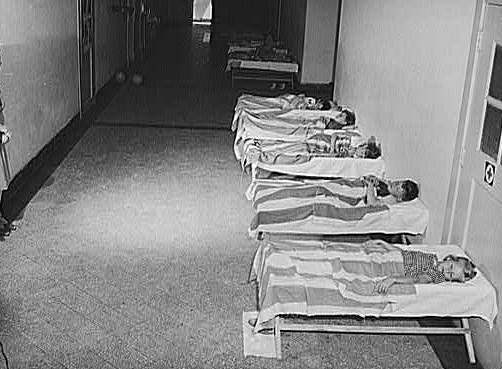 photo of pupils sleeping in a school hallway in Orange, Texas