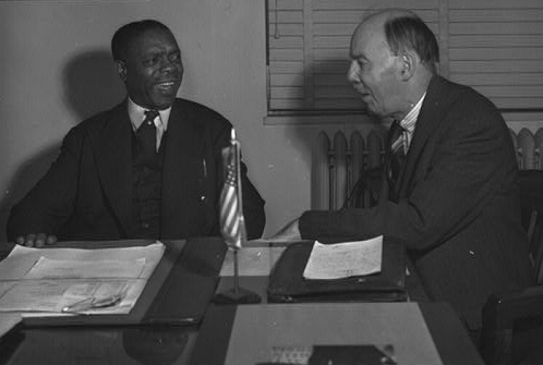 Dean William Pickens and James L. Houghteling of the Treasury Department